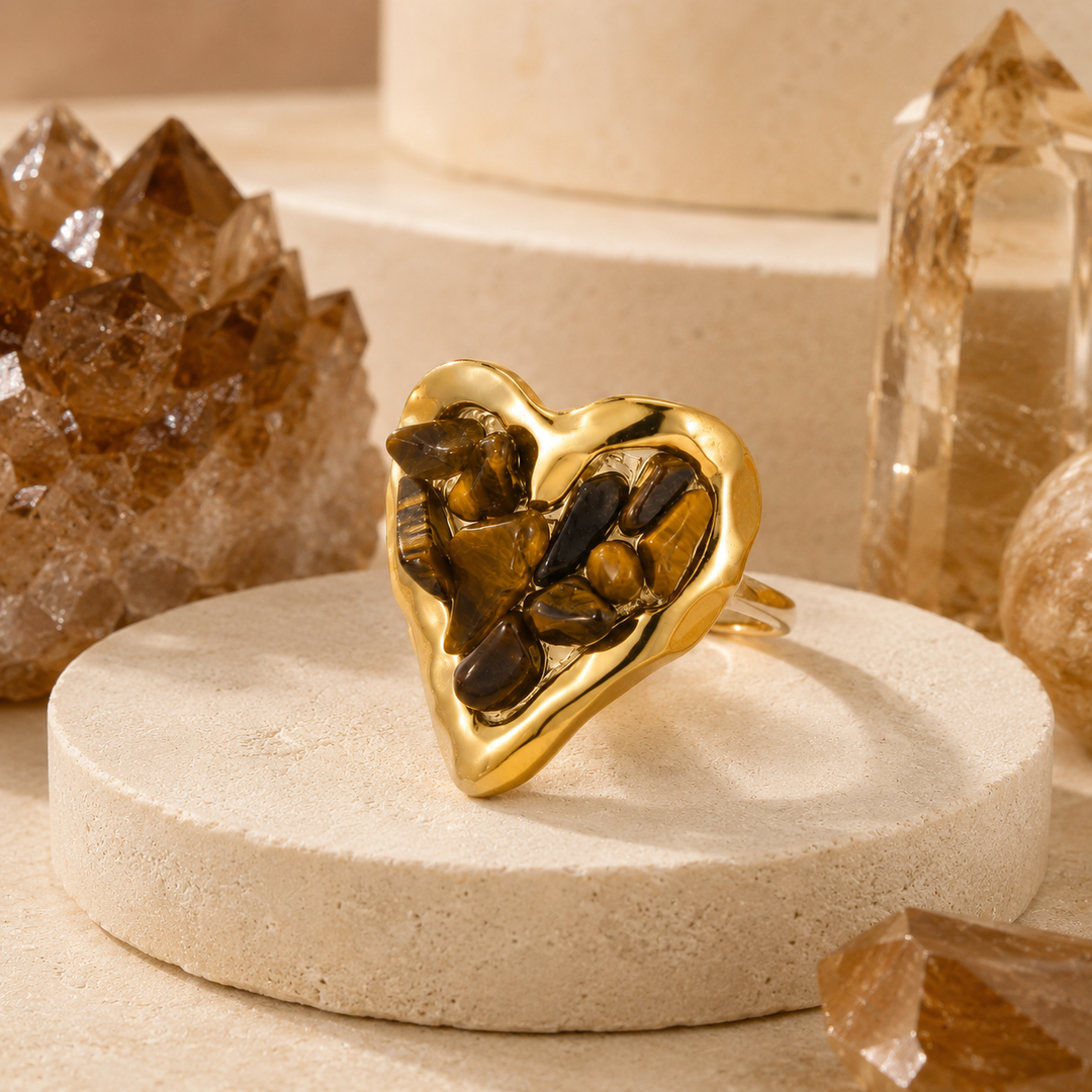 Orphaya gold heart ring featuring rich brown tiger’s eye crystal chips with natural golden banding.